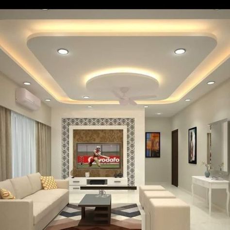 Latest Modern Living Room False Ceiling Design Ideas 2023 | POP False Ceiling Design Is your living room looking a bit dated? Check out these latest Modern Living Room False Ceiling Design Ideas 2023 | POP False Ceiling Design ideas to refresh your space! From bold to subtle, these designs will create a striking impact on your home. Whether you're looking for a dramatic change or something more subtle, these designs will have you looking forward to sitting down in your living room again! Best False Ceiling Designs, Latest False Ceiling Designs, Pop Design For Hall, Gypsum Ceiling Design, Bedroom Pop Design, Simple Ceiling Design, Down Ceiling Design, Plafon Gypsum, Pvc Ceiling Design