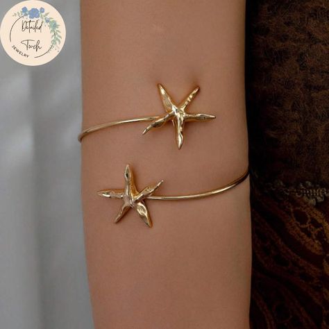 Golden Starfish1 Pc Color Cute Arm Cuff Armband Beach Body Jewelry, Women's Accessory, Women's Gift ▪️ Material: Iron ▪️ SteelColor: Gold ▪️ Plating: No Precious Metal Plated 💎 These stunning and elegant pieces of jewelry perfectly complement any style and add a unique touch of sophistication to your look. From classic pearls to modern geometric patterns, from bohemian necklaces to gothic rings, our extensive collection adds color to your style! These pieces are perfect for completing your look Wedding Bracelets, Arm Cuff Jewelry, Bohemian Necklaces, Gothic Rings, Cuff Jewelry, Arm Cuff, Wedding Jewelry Bracelets, Bohemian Necklace, Precious Metal