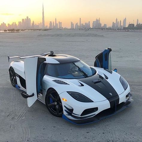 Koenigsegg Agera RS1 with a view of the Dubai skyline! Agera Rs, Two Door Jeep Wrangler, Tmax Yamaha, Cars Tattoo, Tattoo Car, Quotes Car, Car Aesthetics, Drawing Car, Car Tattoo