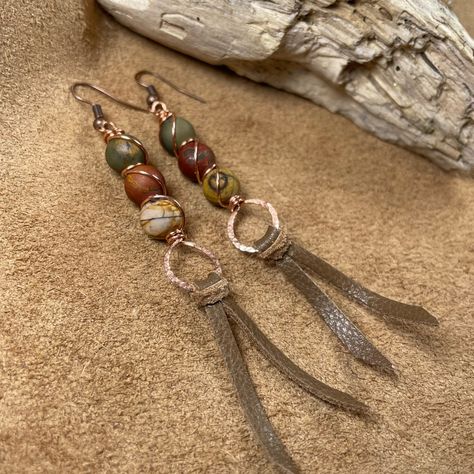 These Artisan Designed Jasper Earrings Feature Matte Finished Red Creek Jasper Aka Picasso Jasper Additionally, I Wire Wrapped The Jasper Beads And Hammered The Copper And Added Hand Cut Leather Strip Fringe Length Is About 4” Antique Copper Hooks Definitely Has That Boho Hippie Western Earthy Vibe Comes Gift Boxed Great Gift Idea For Holidays/Birthdays Anniversary/Mother’s Day Or Just Because Copper And Leather Jewelry, Hammered Copper Earrings, Washer Jewelry, Diy Jewelry Making Tutorials, Sterling Silver Gemstone Earrings, Ear Art, Boho Hoop Earrings, Red Creek Jasper, Gemstone Hoop Earrings