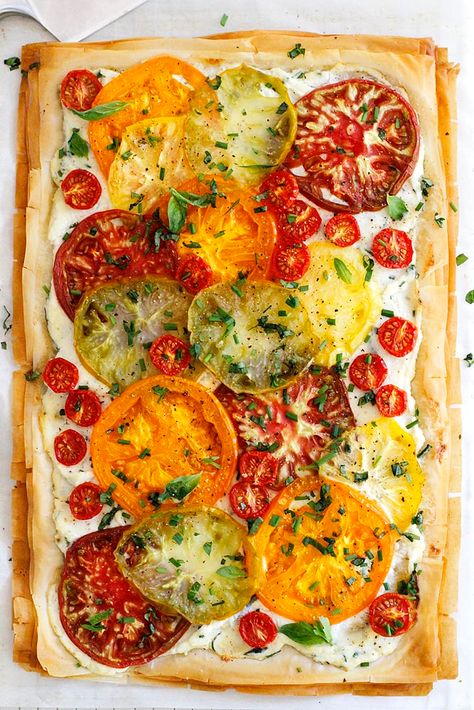 Tomato Ricotta Phyllo Tart Recipe -- An easy, fresh and flavorful phyllo tart with flaky pastry layers, chopped herbs, fresh heirloom tomatoes and a ricotta spread. girlversusdough.com @girlversusdough #girlversusdough #appetizer #easydinner Tomato Feta Phyllo Tart, Filo Tarts Savoury, Phyllo Pastry Recipes Dinner, Things To Do With Tomatoes From Garden, Savory Birthday Cake Alternatives, Savory Pasties, Savory Pastry Recipes, Appetizer Flatbread, Phylo Pastry Recipes