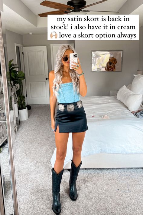 Bodysuit With Cowboy Boots, Cute Outfit Skort, Leather Skirt Nashville Outfit, Cowgirl Mini Skirt Outfits, Leather Shorts Outfit Western, Denim Romper Outfit Ideas, Western Casual Outfits For Women Summer, Outfits With Black Denim Skirt, Country Concert Vegas Outfit