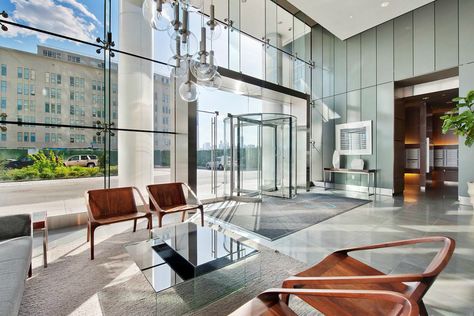 9 apartment lobbies that make a great first impression Condo Lobby Design, Apartment Building Lobby, Glass Apartment, Small Basement Apartments, Chic Apartment Decor, Apartment Lobby, Small Apartment Building, Building Lobby, Colorful Apartment