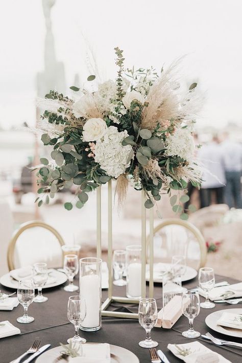 Jun 21, 2021 - A modern, tall centerpiece of eucalyptus, white blooms and pampas grass Popular Wedding Food, Tafel Decor, Tall Wedding Centerpieces, Grass Wedding, Wedding 2025, Wedding Floral Centerpieces, Tall Centerpieces, Pampas Gras, Eucalyptus Wedding