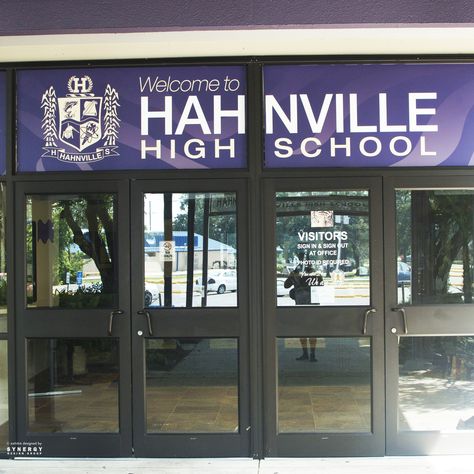 Branded window graphics on client Hahnville High School's entrance. School Window Decorations, School Foyer, School Lobby, Branded Environments, School Branding, Window Wrap, Installation Ideas, Pole Banners, School Entrance