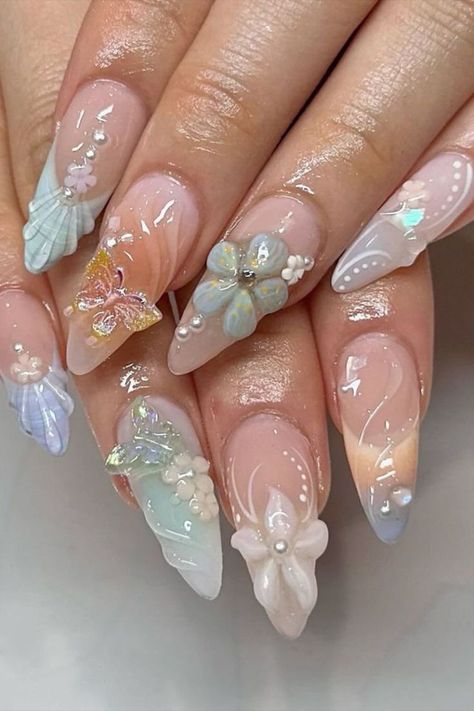 Achieve a harmonious blend of soft pastel tones and vibrant colors with this nail design by @shi_nailedit featuring 3D flowers and butterflies, creating a whimsical and enchanting look that’s perfect for adding a pop of color to your style while maintaining a delicate and feminine aesthetic. Don't miss out on the latest trends in nail art! Head over to nailustrous.com now to dive into our comprehensive article and discover a world of stunning ideas waiting just for you! 3d Design Nail Art, Acrylic Nail 3d Designs, 3d Nails Aesthetic, Pop Up Nail Art, Nail Inspo 3d Art, Nail Designs 3d Art, Flower For Nails, Soft Color Nail Ideas, Nail 3d Art