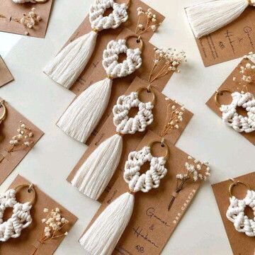 Wedding Favors! Cheap wedding favor ideas that your guests will love! Find ideas from DIY, cheap, creative, unique, inexpensive, elegant, classy, useful and more. Pick a wedding shower favor idea for guests that they will be happy to take home. Amazing favor ideas for any theme wedding you want to give your guests a Cheap gift to take home. Find the best Cheap wedding favor ideas now! ... less ... less Cheap Wedding Favor Ideas, Cincin Diy, Simpul Makrame, Cheap Wedding Favors, Diy Cadeau Noel, Wedding Favor Ideas, Macrame Knots Pattern, Macrame Wedding, Macrame Wall Hanging Diy