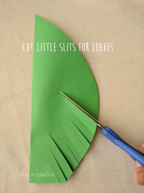 DIY Moana Inspired Palm Trees | Hip N' Creative Palm Tree Paper Craft, How To Make Palm Tree Leaves, Palm Tree Craft For Toddlers, Palm Leaf Craft For Preschool, Palm Tree Door Decorations Classroom, Palm Craft For Kids, How To Make A Palm Tree Out Of Paper, Hawaiian Party Crafts For Kids, Palm Tree Craft Preschool