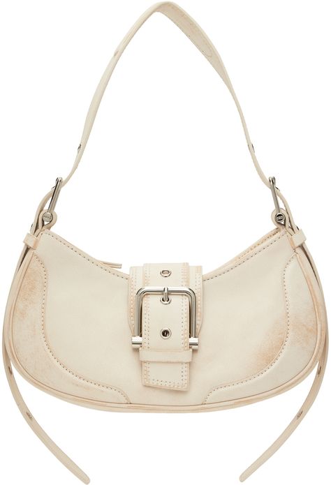 Find Osoi White Brocle Bag on Editorialist. Crinkled leather shoulder bag in white. Subtle distressing throughout. · Pin-buckle shoulder strap · Foldover tab with pin-buckle hardware · Zip closure · Patch pocket at interior · Faux-suede lining · Logo-engraved silver-tone hardware · H6 x W10.5 x D3 in Supplier color: Vintage white Coffee Foam, Y2k Handbag, White Shoulder Bag, Lipstick Stain, Buckle Bags, White Purse, Classic Wardrobe Staples, White Purses, Color Vintage