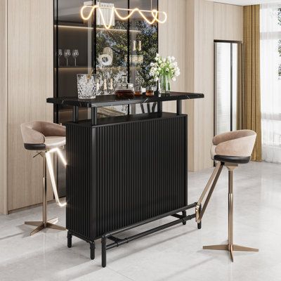 The stylish design modern home bar unit features a sleek and modern design that will add a touch of sophistication to your home kitchen or pub. With its faux marble tabletop and industrial-inspired metal frame, this bar unit is perfect for those who appreciate contemporary aesthetics. | Williston Forge Samina 47.25" Home Bar Wood / Metal in Black / Brown / Gray, Size 44.25 H x 19.75 D in | Wayfair Bar Designs For Home Small Spaces, Home Bar Unit, Small Bar Cabinet, Mixing Cocktails, Free Standing Bar, Tall Bar Cabinet, Bar Wood, Bar Unit, Modern Home Bar