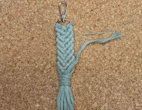 Hello DIYers!This macrame project is about macrame mermaid tail keychain. Mermaid keychain is also called fish keyring, mermaid key holder or key fob.There are almost everything what you need to make keychain in this post. Step by step video tutorial, free patterns images, which types of knot you will use, what size macrame cord for keychains, macramé keychain kit, some keychain prices on Etsy or Amazon.Let’s get started!Supplies for Macrame Tail KeyringYou can choose my macrame keycha… Macrame Mermaid Tail, Macrame Mermaid, Mermaid Tail Keychain, Mermaid Keychain, Tail Keychain, Types Of Knots, Half Hitch Knot, Macrame Knots Tutorial, Knots Tutorial