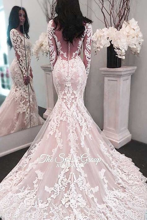 18 Luxurious Pink Wedding Dress Designs A pink wedding dress is a great way to show your creativity and step aside from a traditional white dress. Of course, there are more dramatic options if you want to stand out, like gothic gowns. But these pink dresses are so adorable! http://glaminati.com/pink-wedding-dress/ Long Sleeve Wedding Dress Lace Mermaid, Wedding Court, Long Sleeve Wedding Dress Lace, فستان سهرة, Sleeve Wedding Dress, Lace Mermaid Wedding Dress, Lace Mermaid, Long Sleeve Wedding, Long Wedding Dresses
