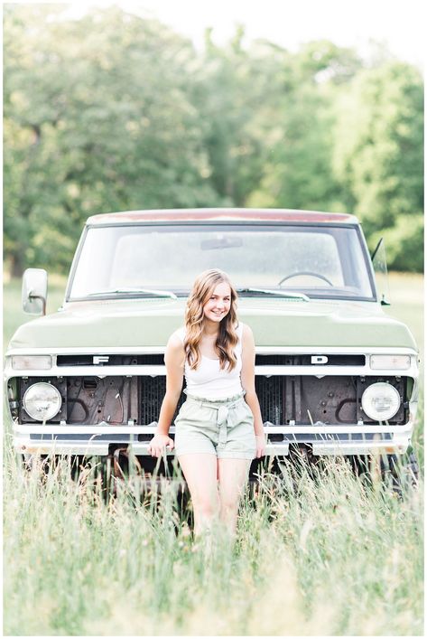 Senior Taylor leaning against an old green Ford truck in a grassy field | CB Studio Country Senior Pictures, Green Ford Truck, Truck Senior Pictures, Female Trucks, Cute Senior Pictures, Senior Photoshoot Poses, Prom Picture Poses, Senior Photo Poses, A Field Of Flowers