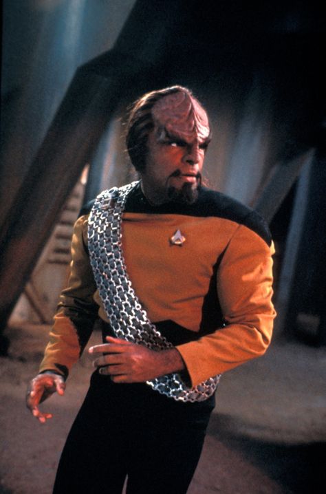 Worf, played by Michael Dorn, is a main character in Star Trek: The Next Generation and in seasons four through seven of Star Trek: Deep Space Nine. He also appears in the films based on The Next Generation. Worf is the first Klingon main character to appear in Star Trek, and has appeared in more Star Trek franchise episodes than any other character. Worf was the only main character to be a regular in more than one live-action Star Trek series. Klingon Empire, Astronomy Telescope, Star Trek Cast, Generation Photo, Star Trek Show, Photo Star, Star Trek Tv, Star Trek Series, Star Trek Images