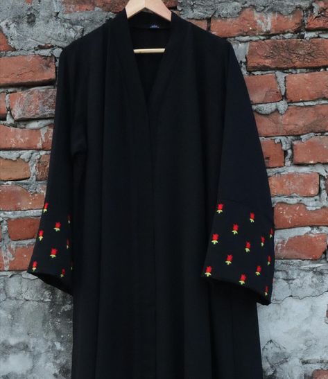 Assalam-o-alaikum sisters! Have you ever wanted to feel confident and stylish while staying modest? Well, I’ve got just the thing for you. Introducing the black CEY Abaya with hand embroidery at the sleeve. This abaya is absolutely stunning and perfect for any occasion. The intricate hand embroidery on the sleeve adds an elegant touch to the already beautiful abaya. And the best part? You can customize it to fit your personal style. So what are you waiting for? Order now and experience the ... Embroidery On Abaya, Embroidery Abaya Design, Abaya Designs Latest Black, Red Abaya, Embroidery Abaya, Black Kurti, Abaya Designs Latest, Abaya Black, Black Abaya