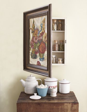 Hidden cabinet storage behind a vintage (or not) painting. This could be cute for many types of storage. I'm loving this example of using it for spices because I need a good space to keep mine that isn't stuffed up in a high cabinet where they're harder to easily access. Old Medicine Cabinets, Hidden Cabinet, Secret Hiding Places, Diy Muebles Ideas, Inexpensive Crafts, Secret Storage, Diy Casa, Cheap Crafts, Vintage Cabinets