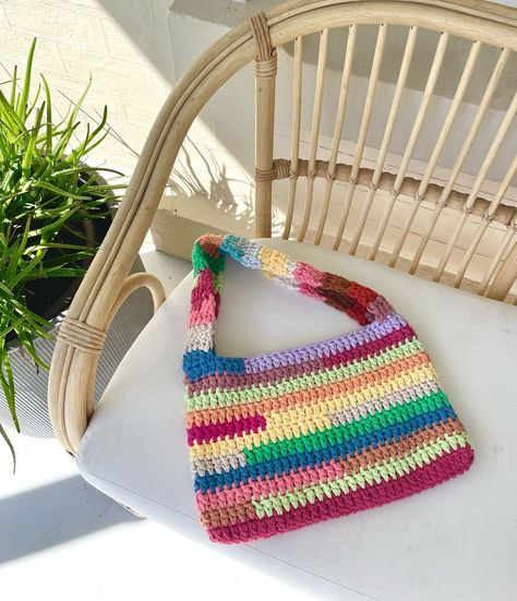 Loving this scrap yarn vibe🌸 I made this crochet bag a few months ago and I definitely need to make a second one this summer!✨ Pattern:… | Instagram What To Do With Scrap Yarn, Crochet Projects With Scrap Yarn, Multicolor Yarn Crochet Projects, Scrap Yarn Crochet Bag, Crochet Scrap Projects, Crochet Scrap Yarn Bag, Scrap Yarn Crochet Projects Ideas, Scrap Yarn Crochet Top, Crochet Rainbow Bag