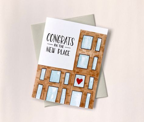 New Apartment Card | New Condo Card Because not everyone buys a house, this card is perfect for someone who has purchased a condo or moved into an apartment. Card features a watercolour brick building with an adorable little red heart in one of the windows. "Congrats on the new place" text is hand drawn in fine tip Sharpie. This card is a reprint of the original artwork. Size: 4.25in x 5.5in (A2) Card is blank inside. Printed on 14pt cardstock in Nova Scotia. Light grey envelope included. Packaged in plastic sleeve and shipped in a stiff Stayflat envelope. *Accessories not included. New Apartment Cards Handmade, New Apartment Card, New Home Watercolor Card, New House Cards Handmade, Card For New Home, New House Card, Moving Apartment, Housewarming Card, New Home Card