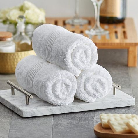 Bath Towel Display, Towel Tray Bathroom, Towels Photography, Hotel Toiletries, Bathroom Decor Pictures, Yellow Bathroom Decor, Towel Display, Towel Tray, Hotel Towels