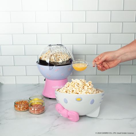 Uncanny Brands Hello Kitty 50th Anniversary Popcorn Maker - Kitchen Appliance Celebrate Hello Kitty's 50th birthday in sweet style with this iconic Hello Kitty shaped popcorn maker! Designed with Hello Kitty’s classic pastel colors, this popcorn maker is perfect for adding a dash of cuteness to your kitchen collection. Whether you're hosting a movie night, a party, or simply craving a tasty snack, this iconic pink popcorn maker delivers freshly popped popcorn with ease. The top cover doubles as Sweet Style, Pink Popcorn, Kitchen Appliance, Kitchen Collection, Popcorn Maker, Yummy Snacks, 50th Anniversary, 50th Birthday, Movie Night