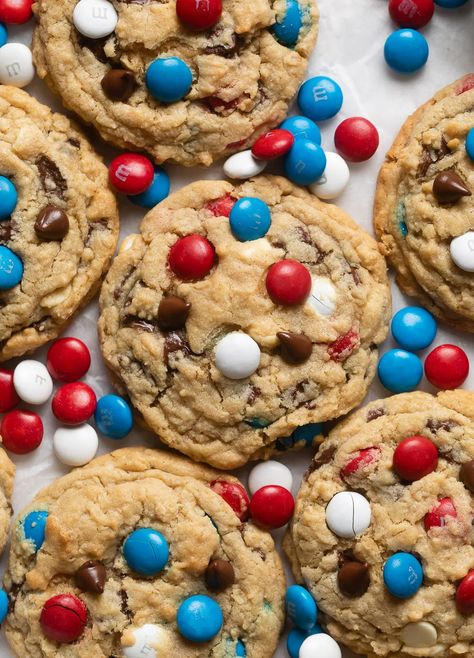 If the Fourth of July were a cookie, this would be it! These soft and chewy giant monster cookies are loaded with all the good stuff. Ready in just minutes with simple ingredients, these 4th of July monster cookies make a perfectly patriotic treat for kids of all ages. Just mix, scoop, and bake! Forth Of July Cookie, Fourth Of July M&m Cookies, Fourth Of July Kid Food, 4th Of July Monster Cookies, Fourth Of July Baking, Fourth Of July Deserts, 4th July Cookies, Forth Of July Food, Fourth Of July Cookies