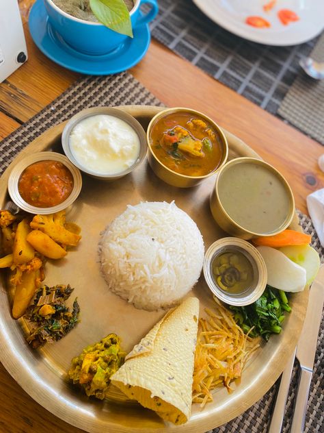 Traditional Nepali thali Nepali Food Traditional, Pickle Salad, Nepalese Food, Nepal Food, Veg Thali, Nepali Food, Brass Plates, Healthy Food Menu, Vegetable Rice