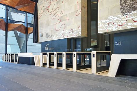 The EasyGate IM turnstiles in stone cladding match the design of the reception desk in 200 George Street office building designed by the awarded architect Francis-Jones Morehen Thorp. Office Building Reception, Reception Desk Office Furniture, Lobby Office, Reception Desk Office, Building Lobby, Office Lobby, Stone Cladding, Inside Outside, Reception Desk