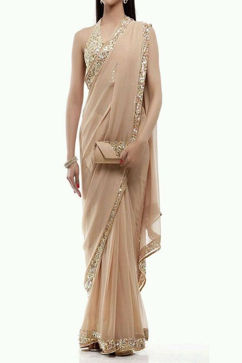 A personal favourite from my Etsy shop https://www.etsy.com/in-en/listing/528091264/gold-and-nude-color-embroidered-sari Beige Plain, Indian Bridesmaids, Bridesmaid Saree, Mode Shoes, Salwar Kamiz, Ghagra Choli, Sari Blouse, Indian Couture, Stylish Sarees