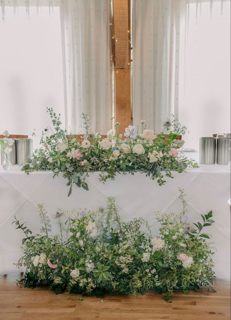 Soring pastel wedding reception table Madeleine, Top Table Meadow Flowers, Sweetheart Table Wildflowers, Pastel Wedding Reception, Wedding Top Table Flowers, Top Table Flowers, Flower Meadows, Wildflower Wedding Theme, Pastel Wedding Colors