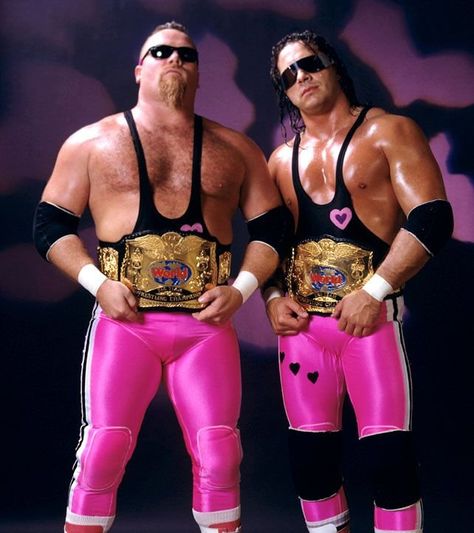 Jim Neidhart and Bret Hart Wrestling Costumes, Hart Foundation, Famous Wrestlers, Wrestling Belts, Wwf Superstars, Hitman Hart, Bret Hart, Wwe Tag Teams, Professional Wrestlers