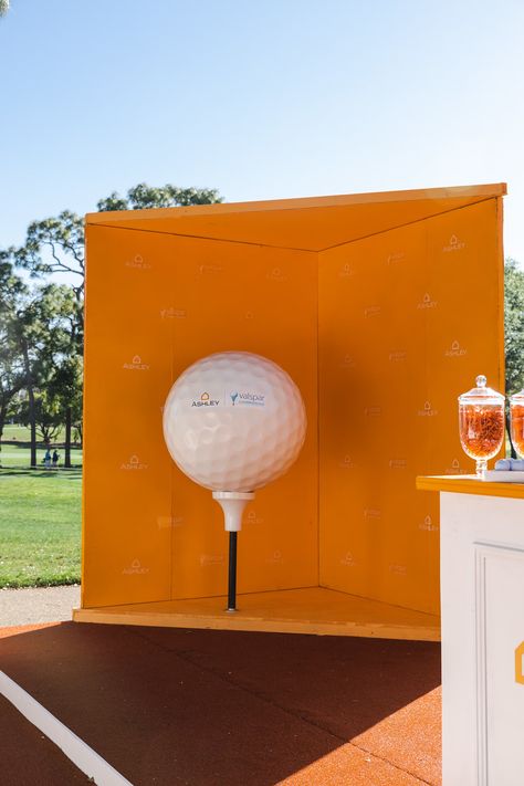 There were also curated photo moments—like a giant golf ball—and a swag bar, while the vibrant color scheme and hanging paint chips nodded to the tournament's title sponsor, paint manufacturer The Valspar Corporation. Overall, 125,000 people attended the four-day golf tournament. Photo: Courtesy of Ashley Golf Event Decor, Unique Event Decor, Golf Theme Party, Golf Events, Corporate Events Decoration, Special Events Decor, Golf Chipping, Masters Golf, Golf Event