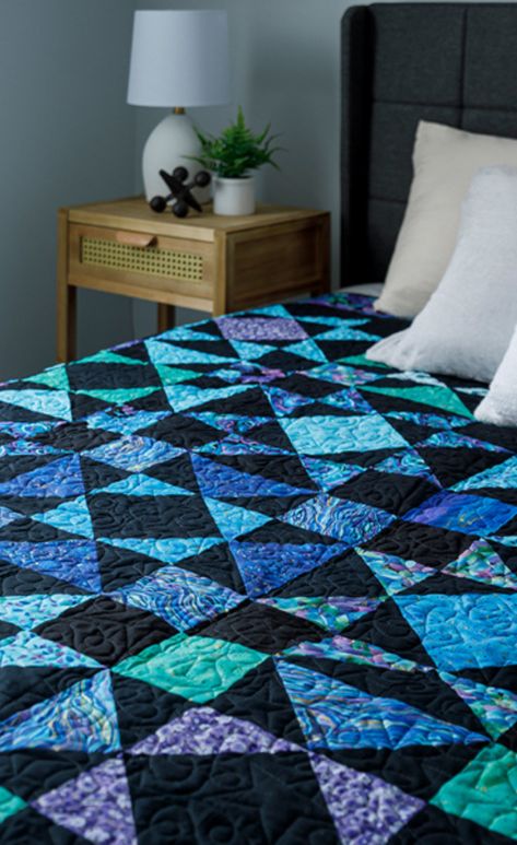 Watch this Fancy Forest Lights Quilt Pattern Tutorial. Get ready to sew some magic with the Forest Lights quilt pattern. Patchwork, Purple And Green Quilts, Galaxy Quilts, Forest Lights, Constellation Quilt, Blue Quilt Patterns, Airplane Quilt, Missouri Star Quilt Company Tutorials, Missouri Star Quilt Tutorials