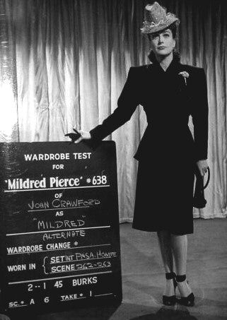 Introduction of ankle-strap shoes and shoulder pads -- Joan Crawford in Mildred Pierce! Eve Arnold, Mildred Pierce, Classic Film Noir, Betty Davis, Hollywood Costume, Noir Movie, Old Hollywood Movies, Motion Pictures, Rehearsal Dress