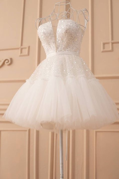 Short Wedding Dress, Reception Dress For Bride, Bridal Shower Dress Off white tutu tulle dress with corset top part with V neckline and tulle bottom. Dress is above knees and has lace up back. Dress is beaded with sequins and pearls. Such dress will be perfect for any special occasion. Dress can be tailored in different colors or color combinations, just contact me with your request. Fabric:Beaded tulle, Satin, tulle Length of the dress can be made as you wish. Any changes of the design of the dresses are possible, additional charge may be applied Sizes For better fit you can leave in comment with your order your measurements: Height Bust  Waist Hips Length of the dress from waist to hem   Shipping After payment is received dress will be ready to ship in  7-10 business days. I provide worl Reception Dress For Bride, White Reception Dress, Bride Reception Dress, After Party Dress, Wedding Dress Reception, Reception Dress Short, After Wedding Dress, Bridal Reception Dress, Bride Reception Dresses