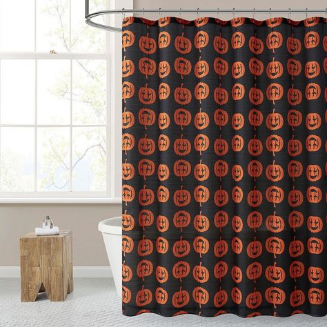 Experience the enchanting spirit of Halloween with the Kate Aurora Halloween Accents Black & Orange Spooky Jack O' Lanterns Fabric Shower Curtain - a captivating addition to elevate your bathroom decor. Immerse yourself in the festive charm of the Halloween season with this bewitching shower curtain, featuring spooky Jack O' Lanterns against a captivating black and orange backdrop. Crafted with meticulous attention to detail, this shower curtain exemplifies Kate Aurora's dedication to quality an