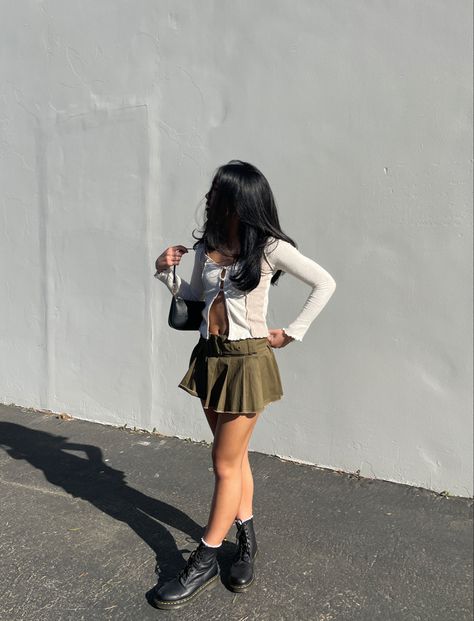 outfit inspo outfit ideas green mini skirt Outfits With Green Mini Skirt, Olive Green Denim Skirt Outfit, Green Skirt And Sweater Outfit, Doc Martens Mini Skirt, Mini Green Skirt Outfit, Sage Green Mini Skirt, Forest Green Skirt Outfit, Olive Mini Skirt Outfit, How To Style A Green Skirt