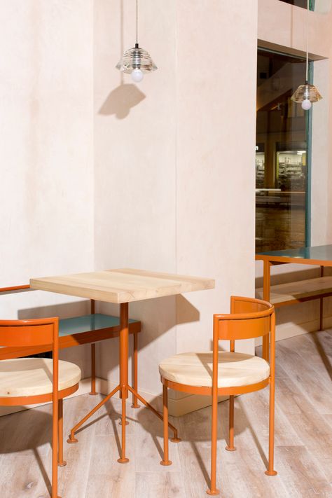 Baking ingredients inform soft-hued interiors of Juana Limón cafe in Madrid Café Interior, Restaurant Courtyard, Yellow Restaurant, Rustic Wood Floors, Modern Cafe, 카페 인테리어 디자인, Traditional Interior Design, Restaurant Chairs, Restaurant Furniture