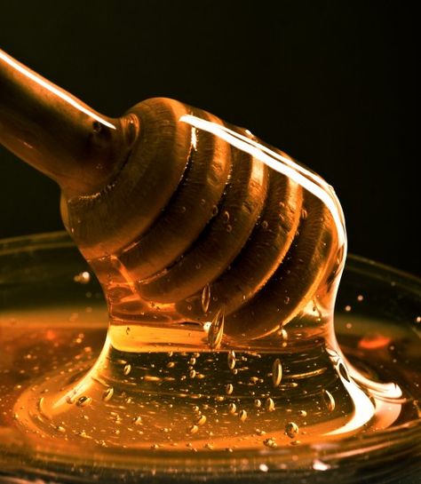 Golden Honey -- honey is perhaps nature’s perfect food, since it never goes bad, ever. Its powers don’t stop there though, since it is also nature’s antiseptic, meaning it can fix everything from a burn to a sore throat.  http://www.toptenz.net/top-10-foods-that-are-surprisingly-good-for-you.php#ixzz2OYvFYApt Honey Uses, Blackhead Remedies, Honey Photography, Honey Benefits, Manuka Honey, Acne Remedies, Raw Honey, Bees Knees, Alam Semula Jadi