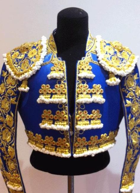 Marvellous professional bullfighter's outfit, made by an authentic bullfighter tailor. This bullfighter's costume is ideal for professional or amateurs of the bull's world and even for collectors. This bullfighter's costume is also perfect for shows or operas... The costumes are very nice as decoration's objects for put them in showcase. All the outfits are new. BLUE color and GOLD, hand embroidered with authentic GOLD thread Approximate measurements: High: 1.80 m Weight: 75kg  The fabrication t Spanish Style, Matador Jacket, Groomsmen Outfit, Matador Costume, Groomsmen Outfits, Wedding Groomsmen, Costumes For Sale, Matador, Gold Threads