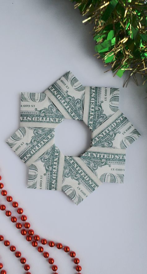 Money Christmas Wreath, Origami Using Dollar Bills, Money Wreath How To Make A, Christmas Tree Dollar Bill Origami, Money Folding Ideas Christmas, Origami Money Christmas Tree, Money Star Origami, Christmas Money Origami Easy, Folding Money For Christmas