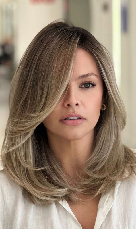 sandy Blonde, hair color trends, brunette, brown balayage, dark hair color ideas, biscuit hair colours, hair color ideas, spring hair colors, blonde balayage, honey brown bronde, bronde hair colors Balayage, Biscuit Hair Colour, Hair For Small Faces, Hair Trends 2024 Color, Trending Haircuts For Women 2024, Dark Blonde Hair Short, Brown Balayage Dark, Mechas Color Beige, Biscuit Blonde Hair