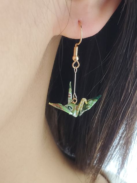 "FOR BLACK AND GOLD CRANES, PLEASE SEE OTHER LISTING HERE:  https://artichouxcanada.etsy.com/listing/1566084287  🌟Introducing the \"Choose Your Color-Origami Crane Earrings-Washi Paper Folded Earrings\", the perfect harmony of classic elegance and imaginative creativity.  💝Some of the benefits associated with these beautiful earrings: 💕A unique flare to your outfit as our Dangling Crane Earrings are the ultimate statement makers.  💕Perfect gift for any occasion, be it a birthday, anniversary Fimo, Origami Crane Earrings, Paper Crane Earrings, Origami Candy, Unique Origami, Origami Lily, Crane Earrings, Origami Earrings, Friend Valentine Gifts