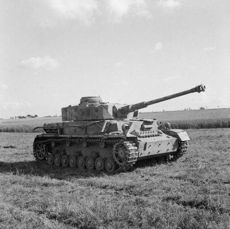 BRITISH ARMY NORMANDY 1944 (B 6345)   A captured German PzKpfw IV tank( long barrel gun version) at 27th Armoured Brigade workshops, 3 July 1944. This vehicle had the turret number '612'. Wwii Tanks, Mg 34, George Patton, Wwii Vehicles, Tank Armor, Panzer Iv, Armoured Vehicles, Tiger Ii, Ferdinand Porsche