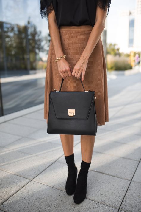 The Miller Affect carrying a black structured handbag from The Styled Collection Bag Shapes, Structured Tote Bag, Structured Purse, Astrology Aesthetic, Elegant Handbags, Elegant Handbag, Structured Handbags, Accessory Design, Structured Bag