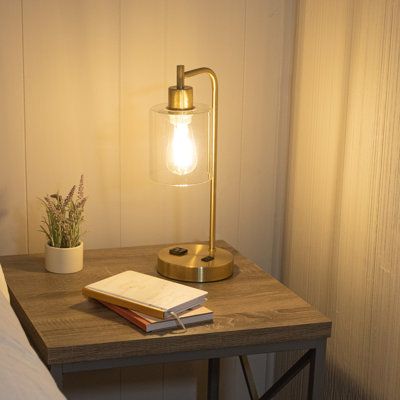 Illuminate your living room, bedroom, entryway, or home office with the Table Lamps by Lavish Home. This desk lamp features an attractive black finish with a glass shade as well as an included LED Edison lightbulb for a modern appearance in any room. The lamp for the living room comes equipped with 2 USB charging ports as well as a 2-prong AC power outlet for functional room décor and turns on/off using touch control. Use this cute lamp on your desk in your home office, beside your bed, in the h Warm Light Lamps, Cute Lamps For Desks, End Tables With Lamps, Gold Lamps Bedroom, Small Lamps Bedroom, Bedroom Lamps Ceiling, Bedroom Lamp Ceiling, End Table With Lamp, Cute Lamps