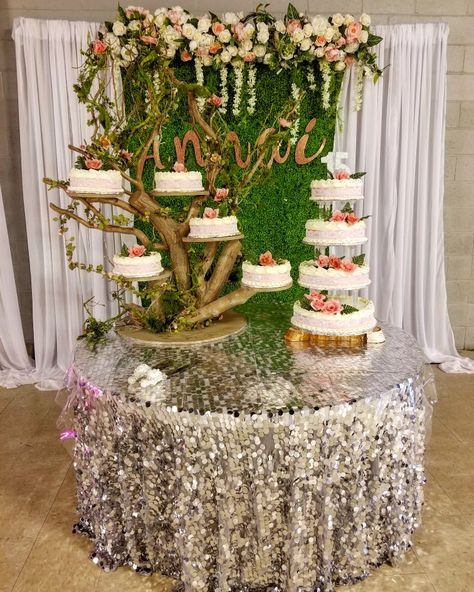Beautiful cake tree, with backdrop for quinceanera  garden theme Rustic Theme Quinceanera Ideas, Garden Theme Sweet 15, Enchanted Forest Quinceanera Cake Ideas, Quince Garden Theme, Quince Cake Enchanted Forest, Enchanted Tree Centerpieces, Enchanted Forest Theme Quinceanera Centerpieces, Quinceanera Cakes Enchanted Forest, Enchanted Forest Themed Cake