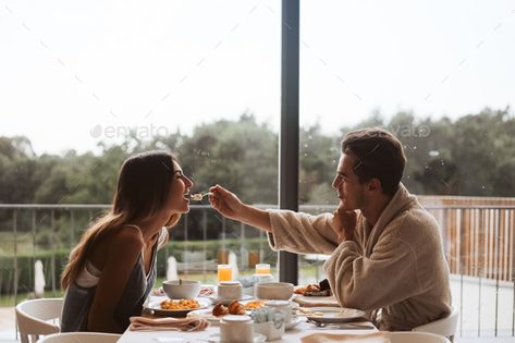 Couple eating breakfast together by TrendsetterImages. Romantic couple eating breakfast together at the hotel #Sponsored #breakfast, #eating, #Couple, #TrendsetterImages Breakfast Together Couple, Couple Making Breakfast, Couple Eating Together Aesthetic, Couples Eating Together, Couples Making Breakfast, Couple Eating Together, Couple Eating Breakfast, Couples Breakfast, Breakfast Photoshoot