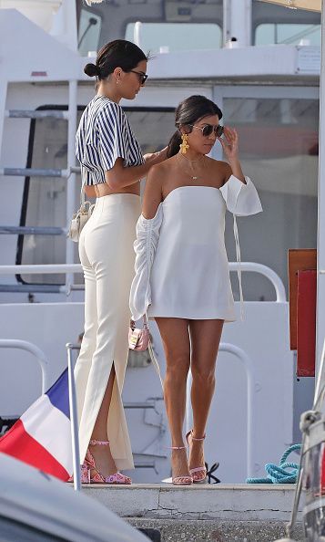 Kendall Jenner stood out on the Cannes red carpet, but it was her off-duty yacht style that really stole the show. Here, we're highlighting her looks. Kourtney Kardashian, Estilo Jenner, Kourtney Kardashian Style, Estilo Kardashian, Jenner Outfits, Jenner Style, Kardashian Style, Vacation Style, White Dress Summer