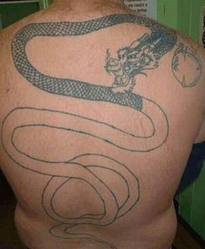 Horrible Tattoos, Terrible Tattoos, Japanese Tattoos For Men, Unique Tattoos For Men, Dragon Tattoos For Men, Dragon Sleeve, Japanese Dragon Tattoo, Rose Tattoos For Men, Dragon Tattoo For Women