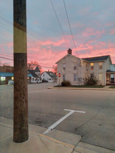 a winter sunset at 4:30 in a lovely small town Small Town Michigan, 1970s Small Town Aesthetic, Small Town Street Photography, Small Town Sunset, Small Rural Town, 80s Small Town, Creepy Small Town Aesthetic, 80s Small Town Aesthetic, Small Town Mystery Aesthetic